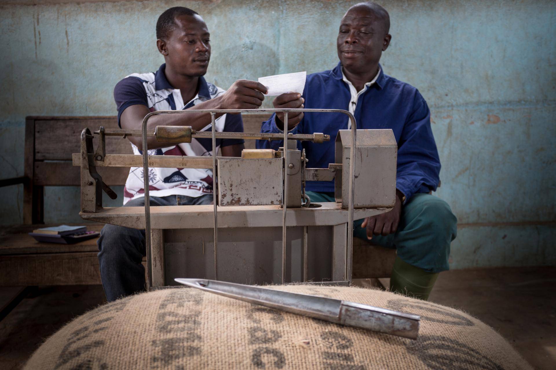 Cocoa farmers at warehouse