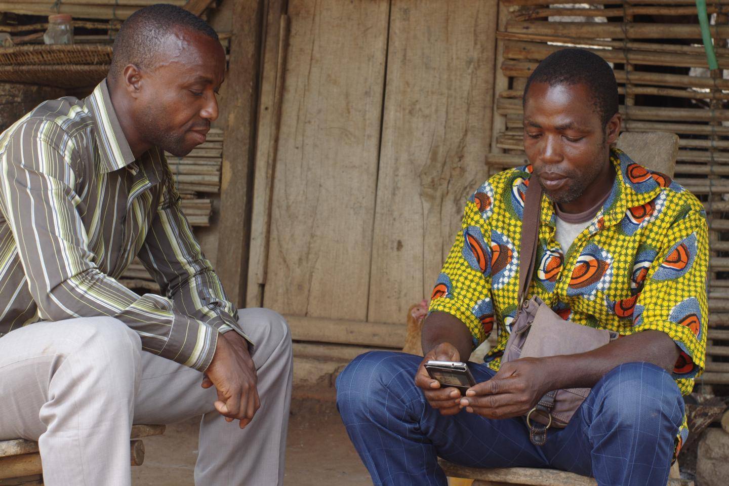 Cocoa farmers with smartphones