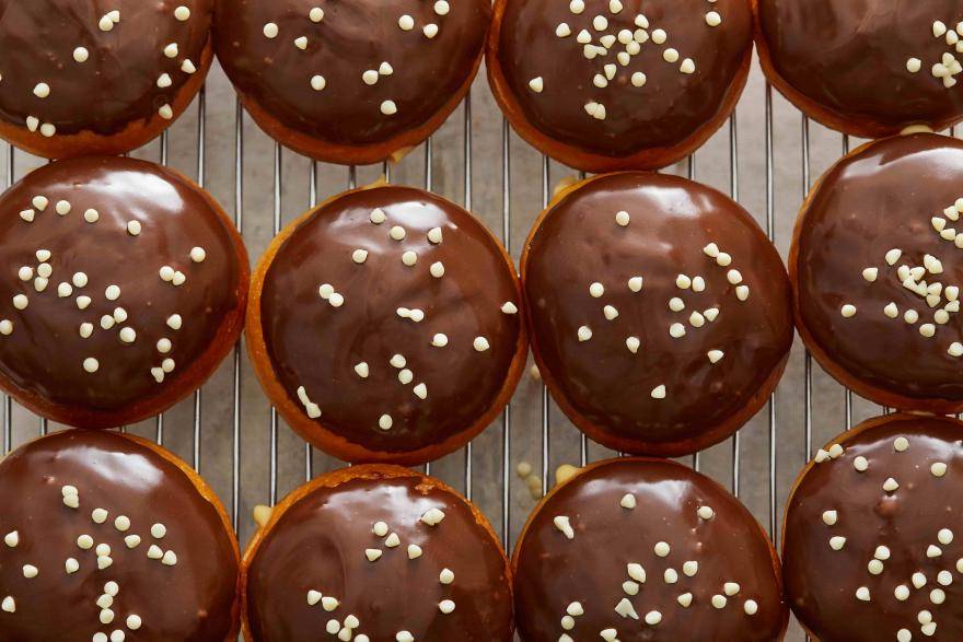donuts with chocolate icing and white sprinkles