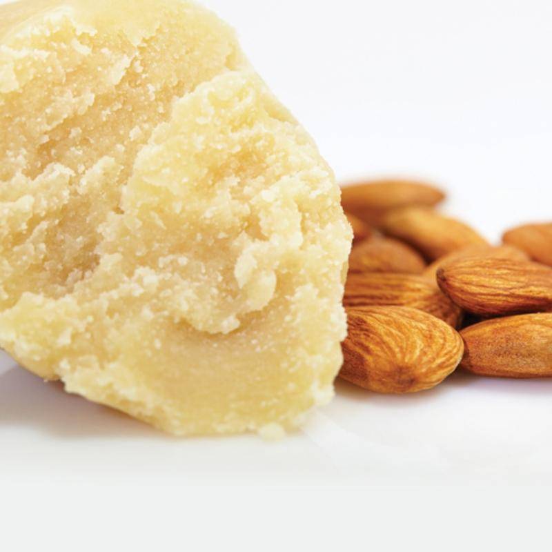 almond paste and almonds on white background
