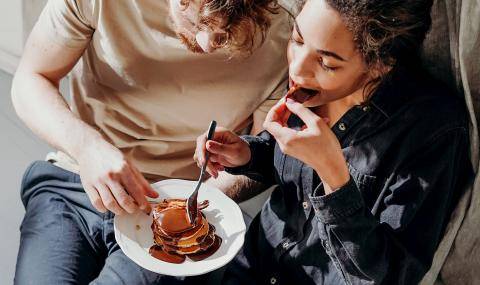 Millennials eating sustainable, ethical, responsible chocolate pancakes