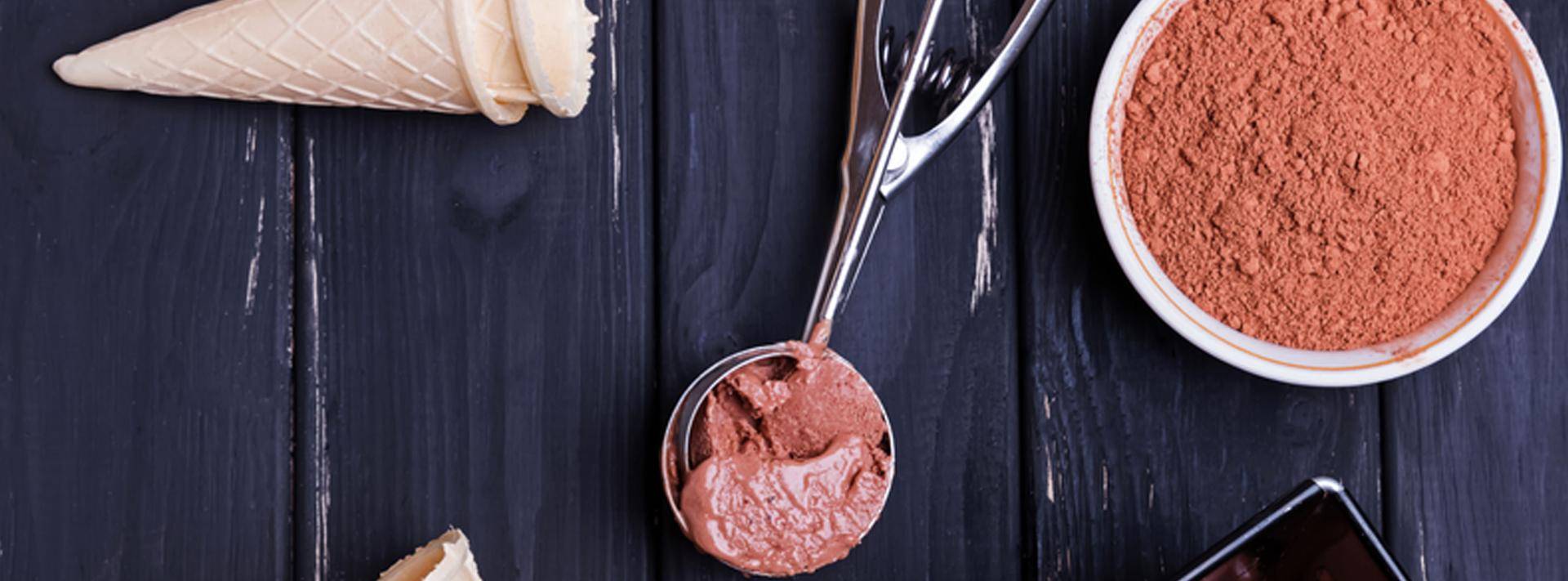 ice cream cone and scoop of chocolate ice cream