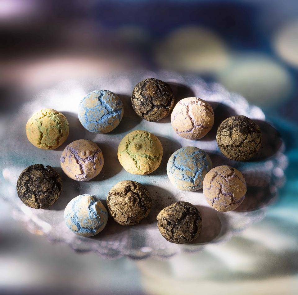 Amaretti dusted with colored truffle powders