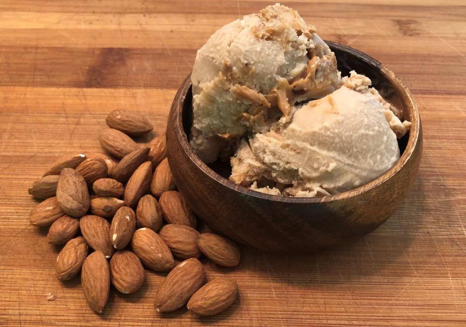 bowl of almond ice cream on cutting board