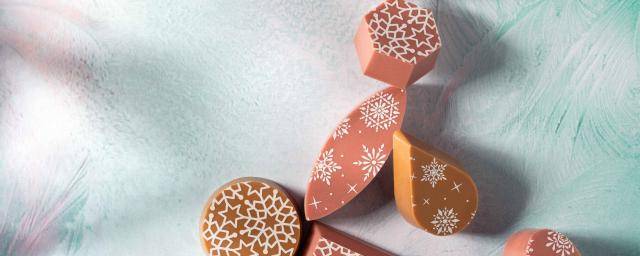 Ruby chocolate and Caramel chocolate pralines, white, snowflake-inspired transfer 